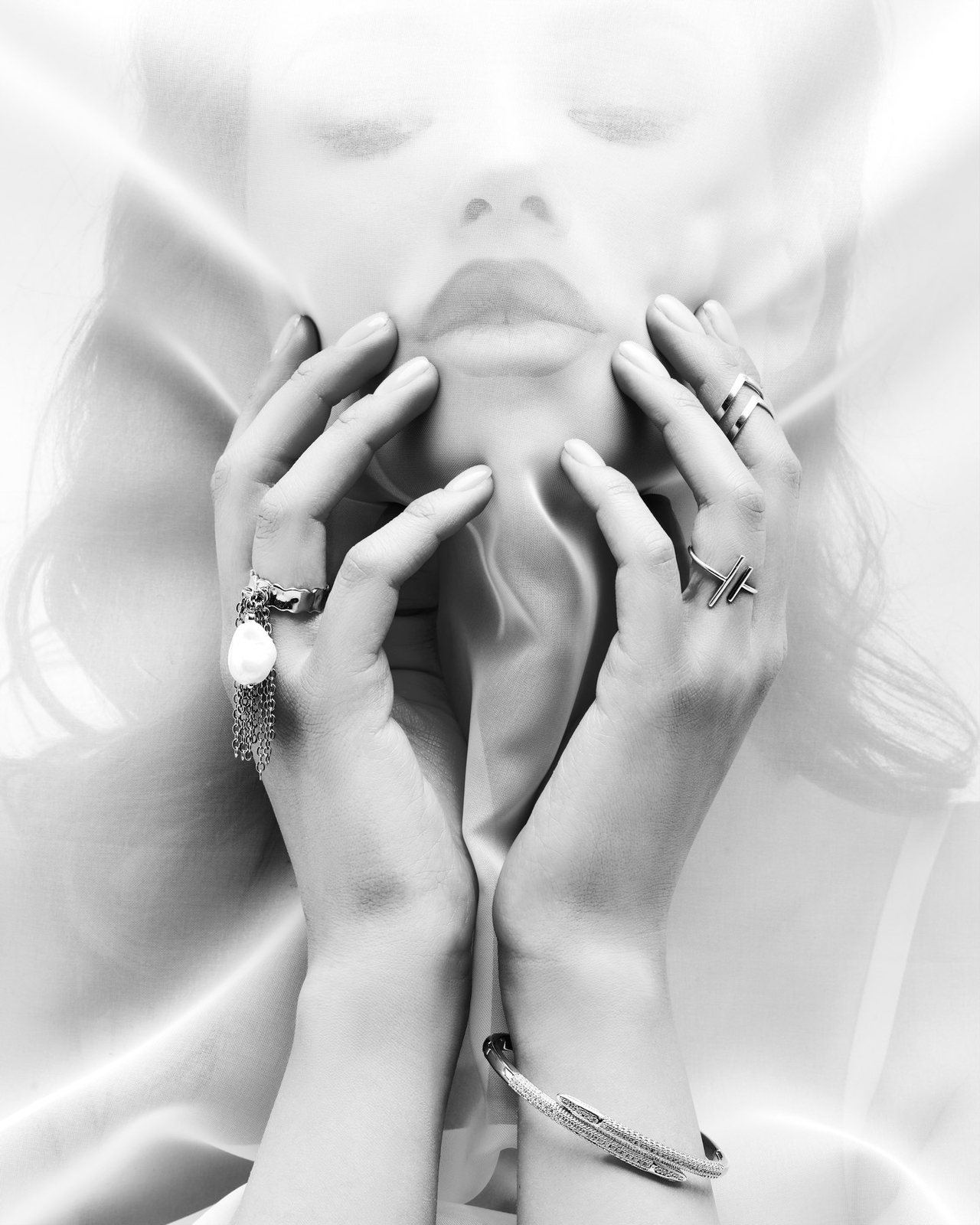 Hands and jewelry detail